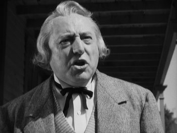 Movie still from “The Ox-Bow Incident” (1942), directed by William A. Wellman – An older man in a suit and tie; Close Up shot, Low angle