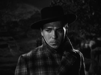 Movie still from “The Ox-Bow Incident” (1942), directed by William A. Wellman – A black and white photo of a man wearing a hat; Close Up shot, Low angle