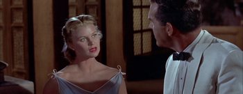 Movie still from “The Rains of Ranchipur” (1955), directed by Jean Negulesco – A man and a woman are talking to each other; Close Up shot, Over the shoulder angle