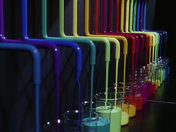 Movie still from “The Reluctant Dragon” (1941), directed by Jack Cutting – A bunch of colorful cups lined up on a table; Extreme Close Up shot, High angle