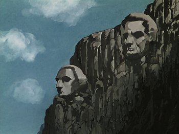 Movie still from “The Reluctant Dragon” (1941), directed by Jack Cutting – A painting of two heads on a cliff; Extreme Wide shot, Low angle