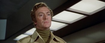 Movie still from “The Swarm” (1978), directed by Irwin Allen – A person wearing a jacket; Close Up shot, Low angle