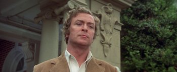 Movie still from “The Swarm” (1978), directed by Irwin Allen – A person wearing a jacket; Close Up shot, Low angle