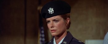 Movie still from “The Swarm” (1978), directed by Irwin Allen – A person wearing a uniform; Close Up shot, Low angle