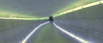 Movie still from “The Truth About Charlie” (2002), directed by Jonathan Demme – A view of the inside of a building with lights on; Extreme Wide shot, High angle