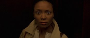 Movie still from “The Truth About Charlie” (2002), directed by Jonathan Demme – A person wearing a jacket; Close Up shot, High angle