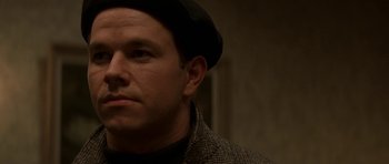 Movie still from “The Truth About Charlie” (2002), directed by Jonathan Demme – A person wearing a hat; Close Up shot, Over the shoulder angle