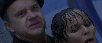 Movie still from “The Truth About Charlie” (2002), directed by Jonathan Demme – A man and a woman's faces; Close Up shot, Low angle