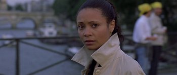 Movie still from “The Truth About Charlie” (2002), directed by Jonathan Demme – A person wearing a jacket; Close Up shot, High angle