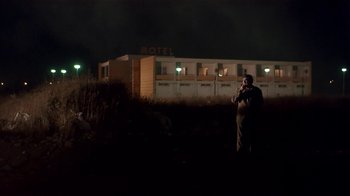 Movie still from “Time of the Gypsies” (1988), directed by Emir Kusturica – A man standing in a field at night; Extreme Wide shot, Low angle