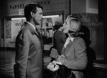 Movie still from “Too Late for Tears” (1949), directed by Byron Haskin – A man and a woman talking to each other; Medium shot, Over the shoulder angle