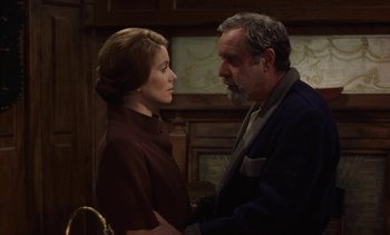 Movie still from “Tristana” (1970), directed by Luis Buñuel – A man and a woman standing next to each other; Medium shot, Over the shoulder angle