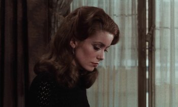 Movie still from “Tristana” (1970), directed by Luis Buñuel – A person with long hair; Close Up shot, Over the shoulder angle