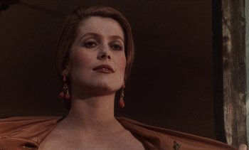 Movie still from “Tristana” (1970), directed by Luis Buñuel – A person wearing a dress; Close Up shot, Low angle