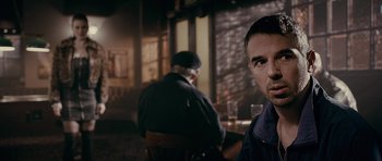 Movie still from “Wild Bill” (2011), directed by Dexter Fletcher – Two men sitting at a table in front of a window; Close Up shot, Over the shoulder angle