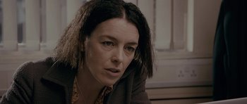 Movie still from “Wild Bill” (2011), directed by Dexter Fletcher – A person wearing a neck tie; Close Up shot, Over the shoulder angle