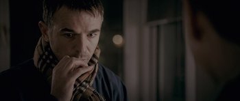 Movie still from “Wild Bill” (2011), directed by Dexter Fletcher – A person wearing a scarf; Close Up shot, Low angle