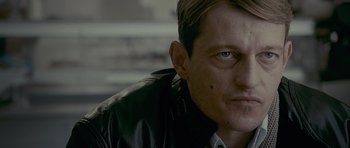 Movie still from “Wild Bill” (2011), directed by Dexter Fletcher – A person wearing a leather jacket; Close Up shot, Low angle