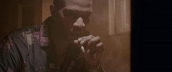 Movie still from “Wild Bill” (2011), directed by Dexter Fletcher – A man is smoking a cigarette in a dark room; Close Up shot, Low angle