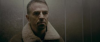 Movie still from “Wild Bill” (2011), directed by Dexter Fletcher – A person wearing a jacket; Close Up shot, Low angle