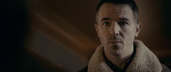 Movie still from “Wild Bill” (2011), directed by Dexter Fletcher – A person wearing a jacket; Close Up shot, Low angle