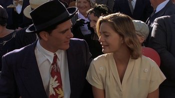 Movie still from “Wild Hearts Can't Be Broken” (1991), directed by Steve Miner – A man and a woman are standing next to each other; Close Up shot, Low angle