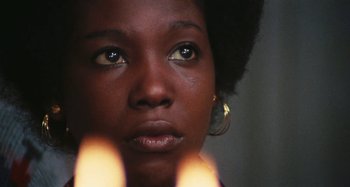Movie still from “Your Vice Is a Locked Room and Only I Have the Key” (1972), directed by Sergio Martino – A woman's eyes and face; Close Up shot, Low angle