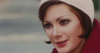 Movie still from “Your Vice Is a Locked Room and Only I Have the Key” (1972), directed by Sergio Martino – A person wearing a hat; Close Up shot, High angle