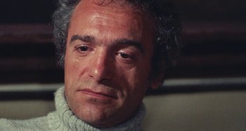 Movie still from “Your Vice Is a Locked Room and Only I Have the Key” (1972), directed by Sergio Martino – A person wearing a sweater; Close Up shot, Low angle