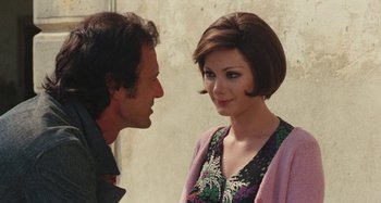 Movie still from “Your Vice Is a Locked Room and Only I Have the Key” (1972), directed by Sergio Martino – A man and a woman talking to each other; Close Up shot, Over the shoulder angle
