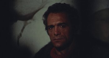 Movie still from “Your Vice Is a Locked Room and Only I Have the Key” (1972), directed by Sergio Martino – A person wearing a jacket; Close Up shot, Low angle