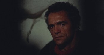 Movie still from “Your Vice Is a Locked Room and Only I Have the Key” (1972), directed by Sergio Martino – A person wearing a sweater; Close Up shot, Low angle