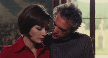 Movie still from “Your Vice Is a Locked Room and Only I Have the Key” (1972), directed by Sergio Martino – An older man and a younger woman looking at each other; Close Up shot, High angle