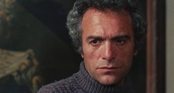 Movie still from “Your Vice Is a Locked Room and Only I Have the Key” (1972), directed by Sergio Martino – A person wearing a sweater; Close Up shot, Low angle
