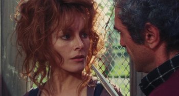 Movie still from “Your Vice Is a Locked Room and Only I Have the Key” (1972), directed by Sergio Martino – A man and a woman looking at each other; Close Up shot, Over the shoulder angle