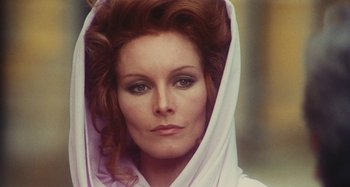 Movie still from “Your Vice Is a Locked Room and Only I Have the Key” (1972), directed by Sergio Martino – A person wearing a hooded shirt; Close Up shot, Low angle