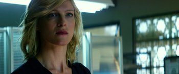 Movie still from “13 Hours” (2016), directed by Michael Bay – A woman with blonde hair looking into the distance; Close Up shot, Low angle