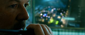 Movie still from “13 Hours” (2016), directed by Michael Bay – A person looking out of a window; Extreme Close Up shot, Over the shoulder angle