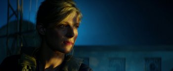 Movie still from “13 Hours” (2016), directed by Michael Bay – A person looking at the camera; Close Up shot, Low angle