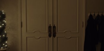 Movie still from “Fargo” (2014), created by Noah Hawley – The door handles of a door; Extreme Close Up shot, High angle