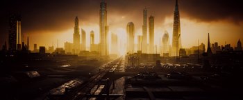 Movie still from “2 Guns” (2013), directed by Baltasar Kormákur – An image of a city with a train track in the foreground; Extreme Wide shot, High angle