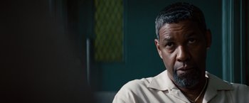 Movie still from “2 Guns” (2013), directed by Baltasar Kormákur – A person wearing a shirt; Close Up shot, Over the shoulder angle