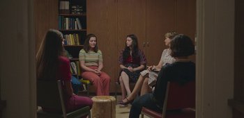 Movie still from “20th Century Women” (2016), directed by Mike Mills – A group of women sitting in a circle; Wide shot, High angle