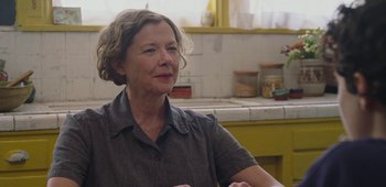 Movie still from “20th Century Women” (2016), directed by Mike Mills – An older woman sitting in front of a kitchen sink; Close Up shot, Over the shoulder angle