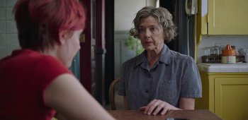 Movie still from “20th Century Women” (2016), directed by Mike Mills – An older woman sitting at a table with a younger woman; Close Up shot, Over the shoulder angle