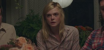 Movie still from “20th Century Women” (2016), directed by Mike Mills – A woman with long blonde hair wearing a striped shirt; Close Up shot, Over the shoulder angle