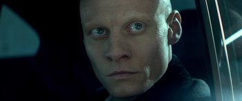 Movie still from “3 Days to Kill” (2014), directed by McG – A person with blue eyes; Extreme Close Up shot, High angle