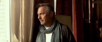 Movie still from “3 Days to Kill” (2014), directed by McG – A person wearing a scarf; Close Up shot, Low angle