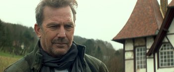 Movie still from “3 Days to Kill” (2014), directed by McG – A person wearing a scarf; Close Up shot, Low angle