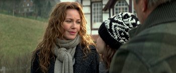 Movie still from “3 Days to Kill” (2014), directed by McG – A woman and a girl are talking to each other; Close Up shot, Over the shoulder angle